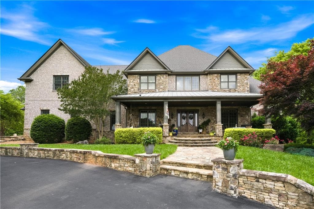 5 bedroom, 4 bathroom, 8,771 sq ft single family residence for sale at 7945 Reinhardt College Parkway, Waleska, GA 30183 — photo 9