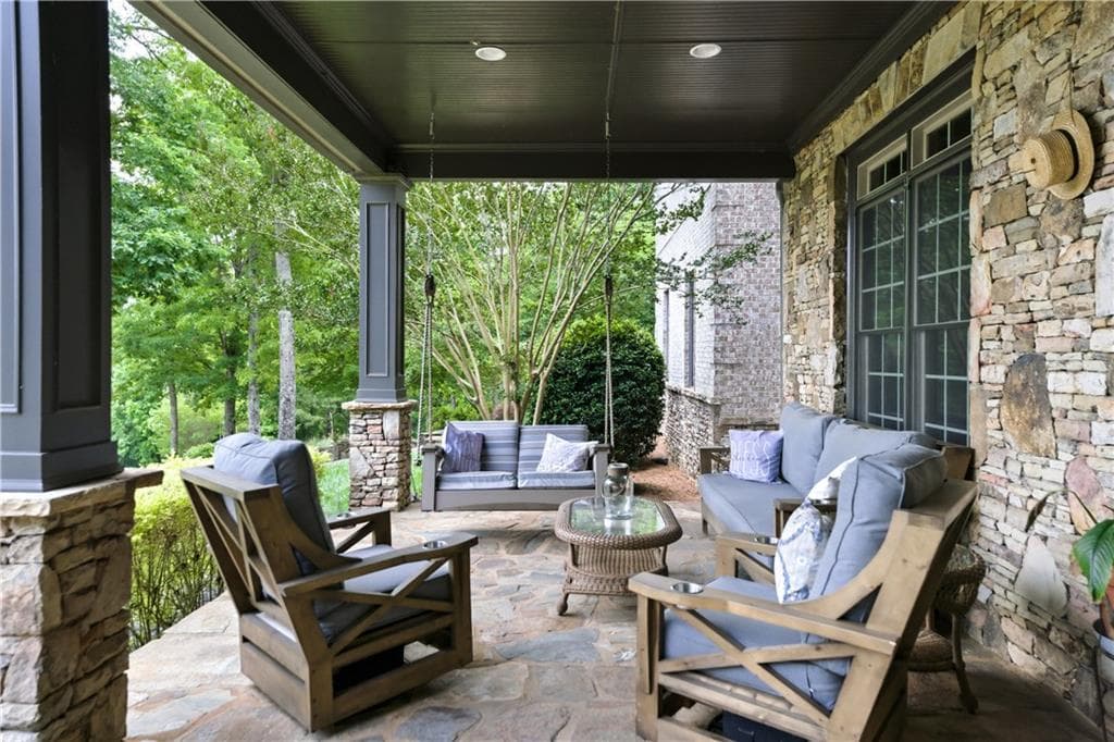 5 bedroom, 4 bathroom, 8,771 sq ft single family residence for sale at 7945 Reinhardt College Parkway, Waleska, GA 30183 — photo 10