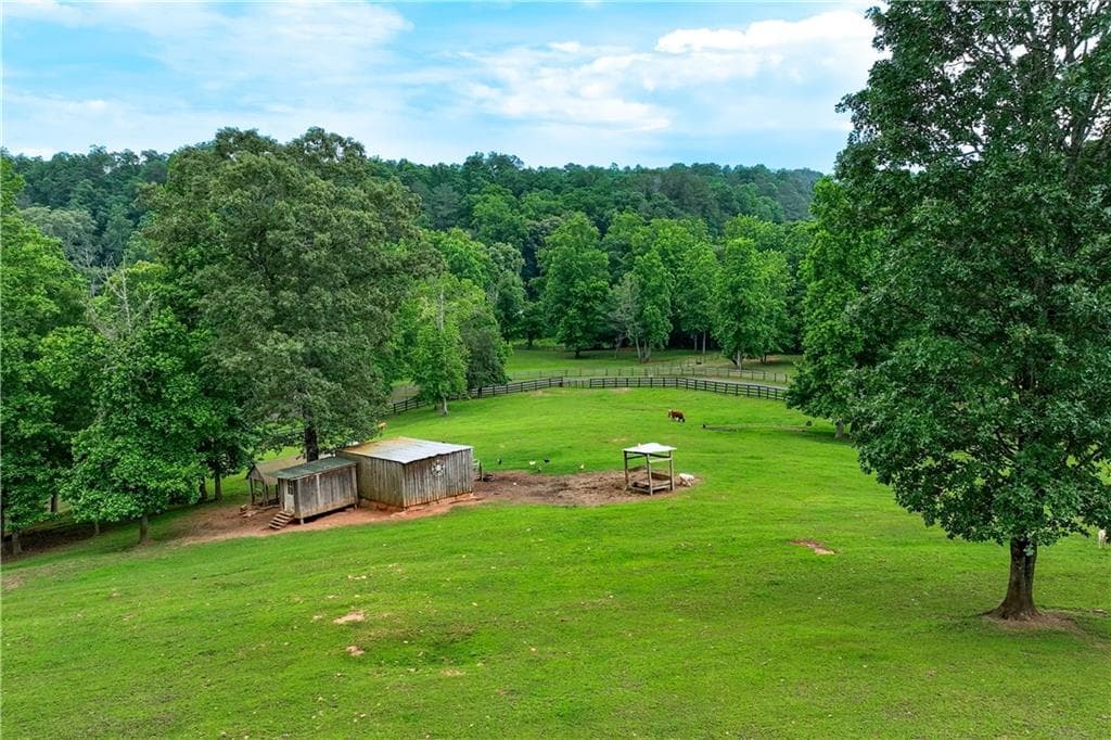 5 bedroom, 4 bathroom, 8,771 sq ft single family residence for sale at 7945 Reinhardt College Parkway, Waleska, GA 30183 — photo 6