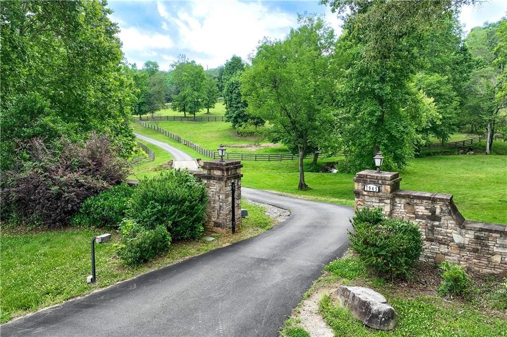 5 bedroom, 4 bathroom, 8,771 sq ft single family residence for sale at 7945 Reinhardt College Parkway, Waleska, GA 30183 — photo 8
