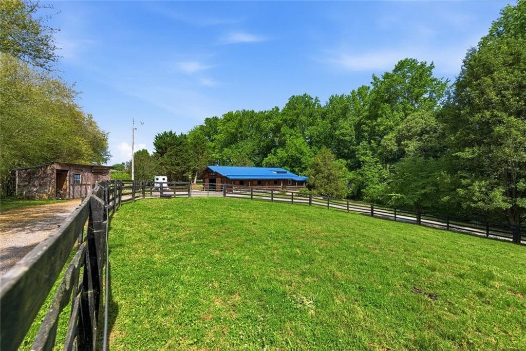 4 bedroom, 4 bathroom, 5,040 sq ft single family residence for sale at 200 McClure Drive, Cumming, GA 30028 — photo 5