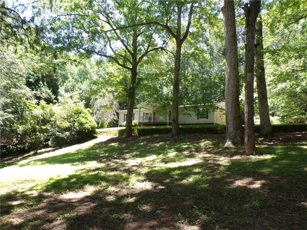 3 bedroom, 2 bathroom, 1,568 sq ft single family residence under contract at 1051 Old Talking Rock Road, Talking Rock, GA 30175 — photo 2