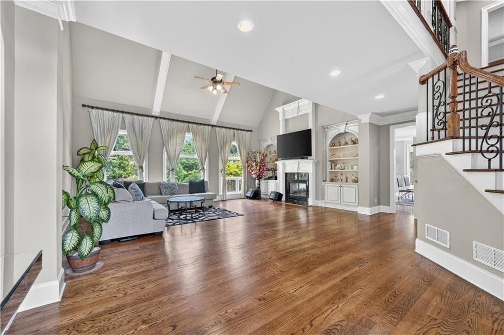 7 bedroom, 5 bathroom, 4,566 sq ft single family residence for sale at 585 Settles Brook Court, Suwanee, GA 30024 — photo 6