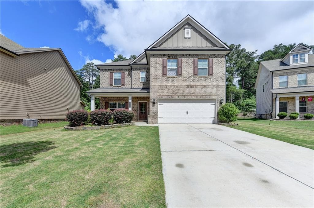 6 bedroom, 4 bathroom, 2,916 sq ft single family residence for sale at 1986 Holman Forest Drive, Hoschton, GA 30548 — photo 2