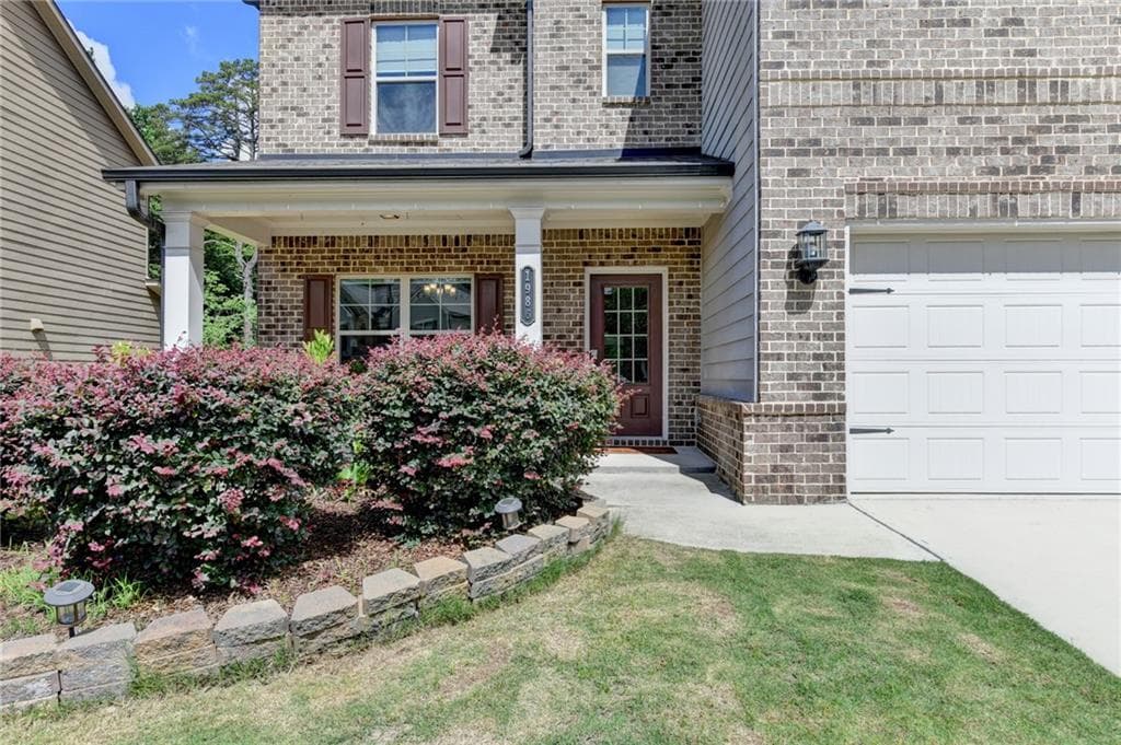 6 bedroom, 4 bathroom, 2,916 sq ft single family residence for sale at 1986 Holman Forest Drive, Hoschton, GA 30548 — photo 3