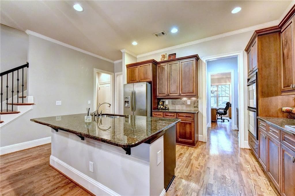 4 bedroom, 4 bathroom, 3,075 sq ft single family residence for sale at 1598 LeGrand Circle, Lawrenceville, GA 30043 — photo 8