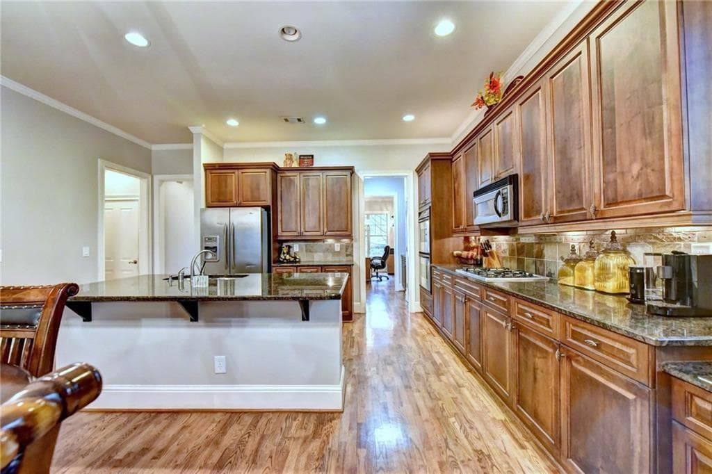 4 bedroom, 4 bathroom, 3,075 sq ft single family residence for sale at 1598 LeGrand Circle, Lawrenceville, GA 30043 — photo 9