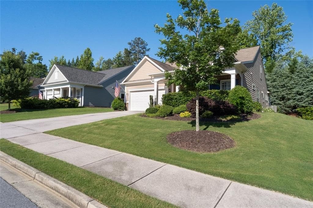 4 bedroom, 3 bathroom, 2,402 sq ft single family residence for sale at 7455 Ashford Manor Way, Cumming, GA 30040 — photo 4