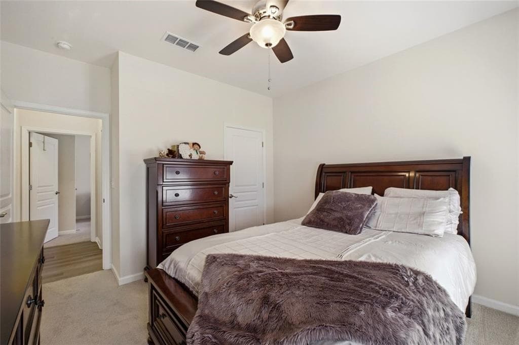 4 bedroom, 3 bathroom, 2,402 sq ft single family residence for sale at 7455 Ashford Manor Way, Cumming, GA 30040 — photo 8