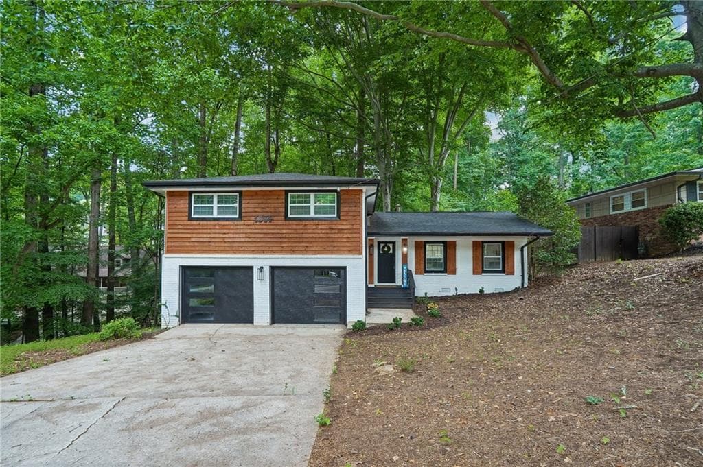 4 bedroom, 3 bathroom, 2,025 sq ft single family residence for sale at 1564 Bubbling Creek Road, Brookhaven, GA 30319 — photo 2