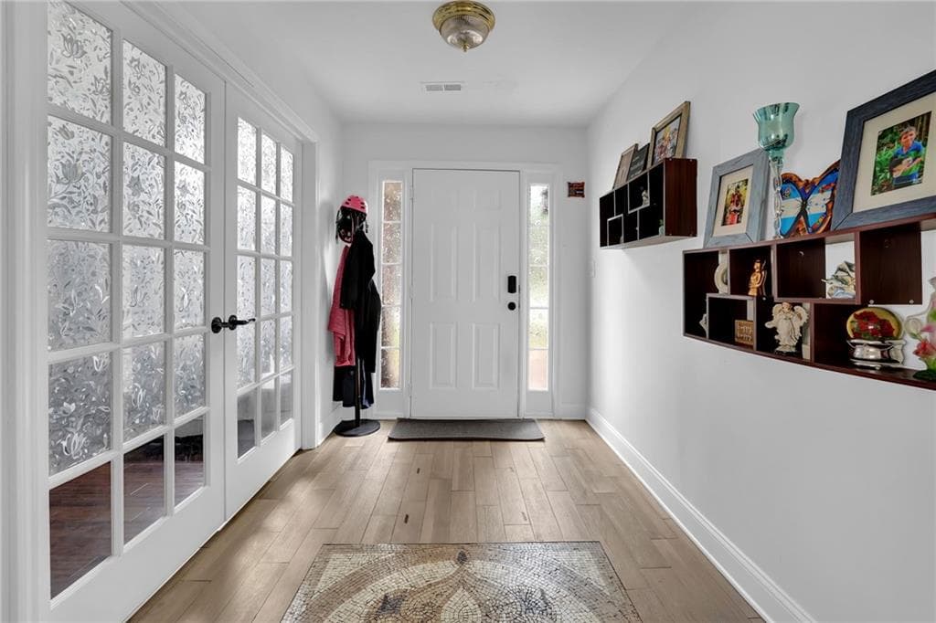 4 bedroom, 3 bathroom, 2,454 sq ft single family residence for sale at 135 Chandler Ridge Lane, Lawrenceville, GA 30045 — photo 4