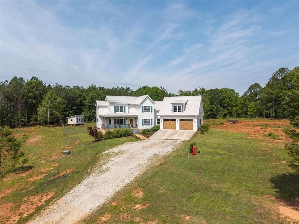 5 bedroom, 4 bathroom, 4,681 sq ft single family residence for sale at 2185 Clotfelter Road, Bogart, GA 30622 — photo 2