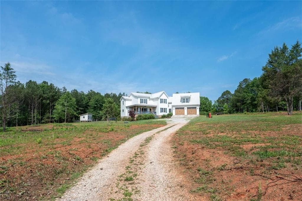 5 bedroom, 4 bathroom, 4,681 sq ft single family residence for sale at 2185 Clotfelter Road, Bogart, GA 30622 — photo 4