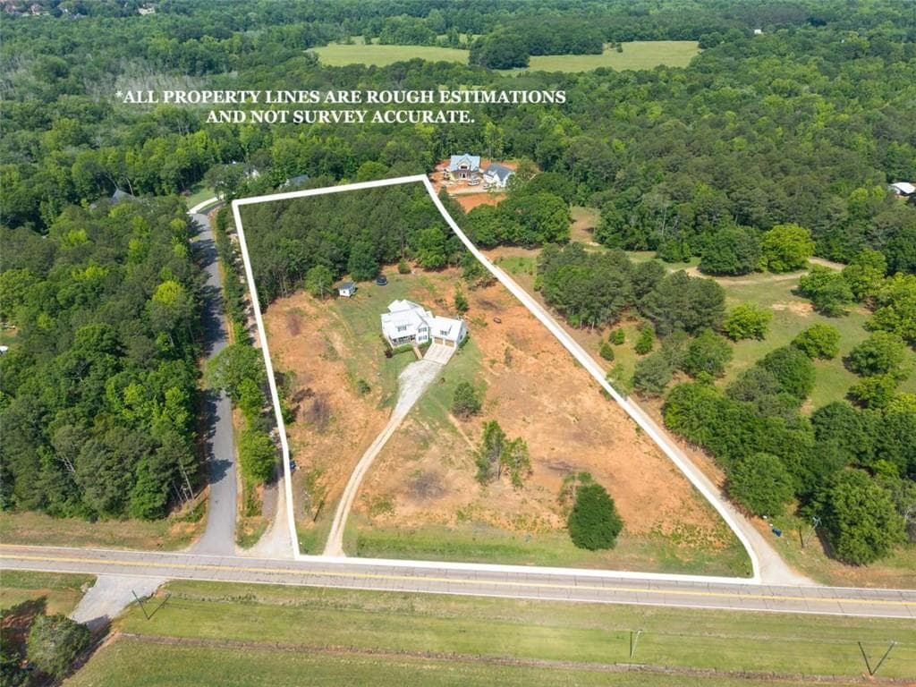 5 bedroom, 4 bathroom, 4,681 sq ft single family residence for sale at 2185 Clotfelter Road, Bogart, GA 30622 — photo 9