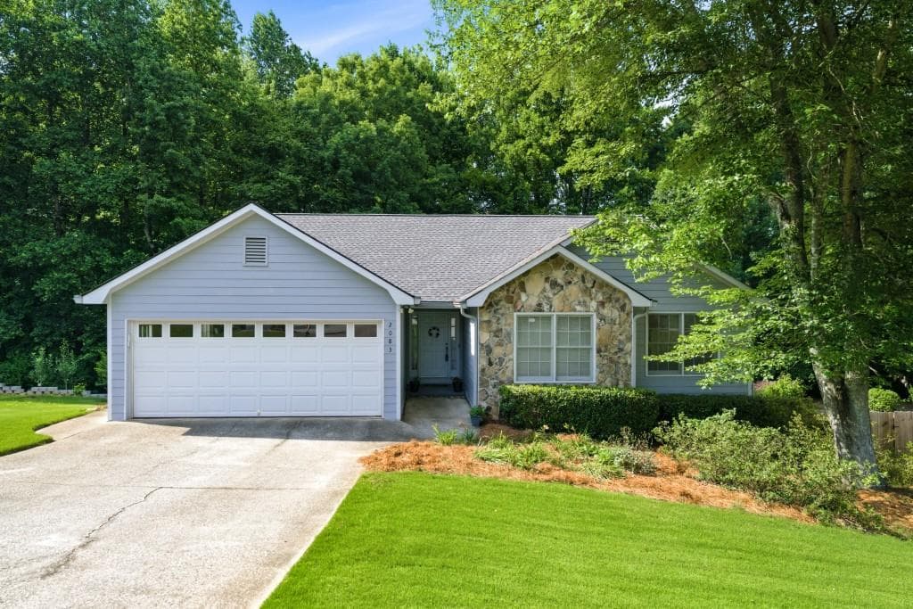 4 bedroom, 3 bathroom, 2,747 sq ft single family residence for sale at 2083 James River Cove, Suwanee, GA 30024 — photo 4