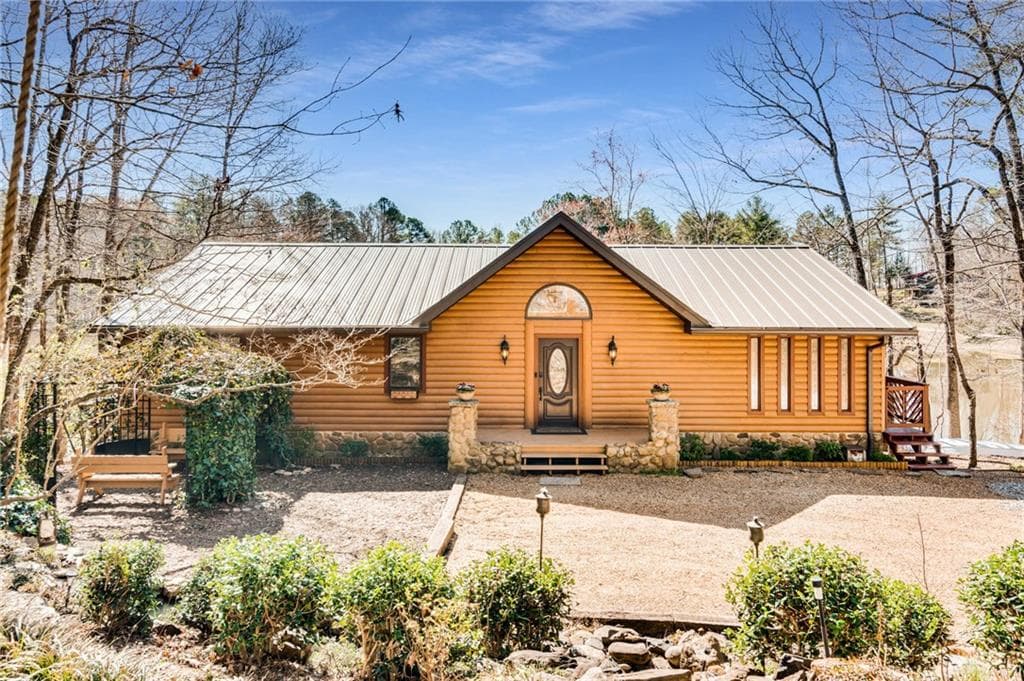 4 bedroom, 3 bathroom, 3,114 sq ft single family residence for sale at 555 Rainbow Lake Drive, Dawsonville, GA 30534 — photo 2