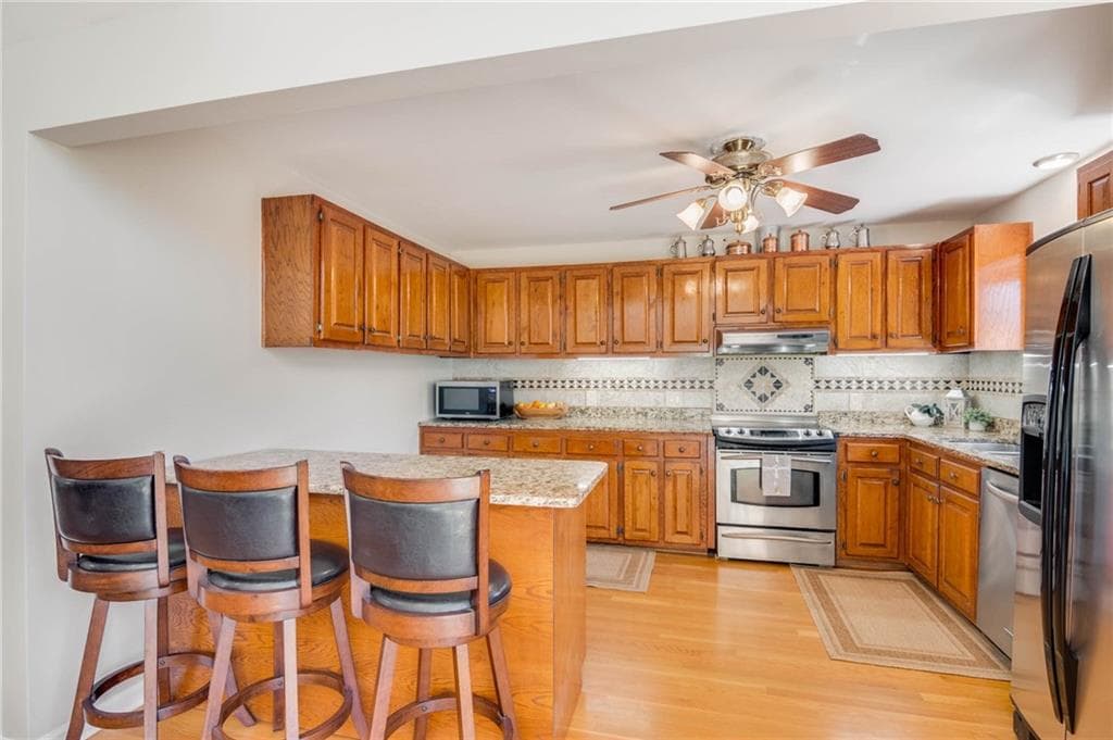 4 bedroom, 3 bathroom, 3,114 sq ft single family residence for sale at 555 Rainbow Lake Drive, Dawsonville, GA 30534 — photo 8