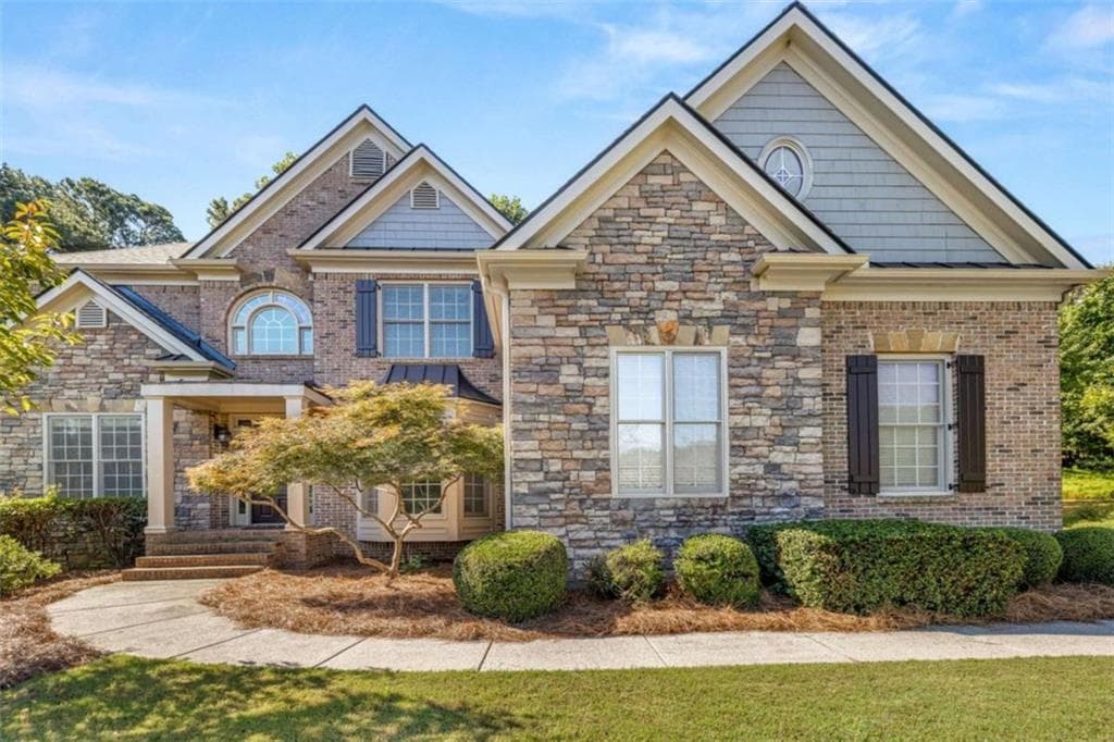 5 bedroom, 4 bathroom, 6,068 sq ft single family residence for rent at 1475 Boomer Circle, Suwanee, GA 30024 for $4,750 a month — photo 1 of 54