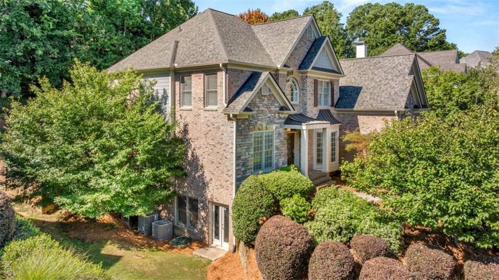5 bedroom, 4 bathroom, 6,068 sq ft single family residence for rent at 1475 Boomer Circle, Suwanee, GA 30024 for $4,750 a month — photo 5