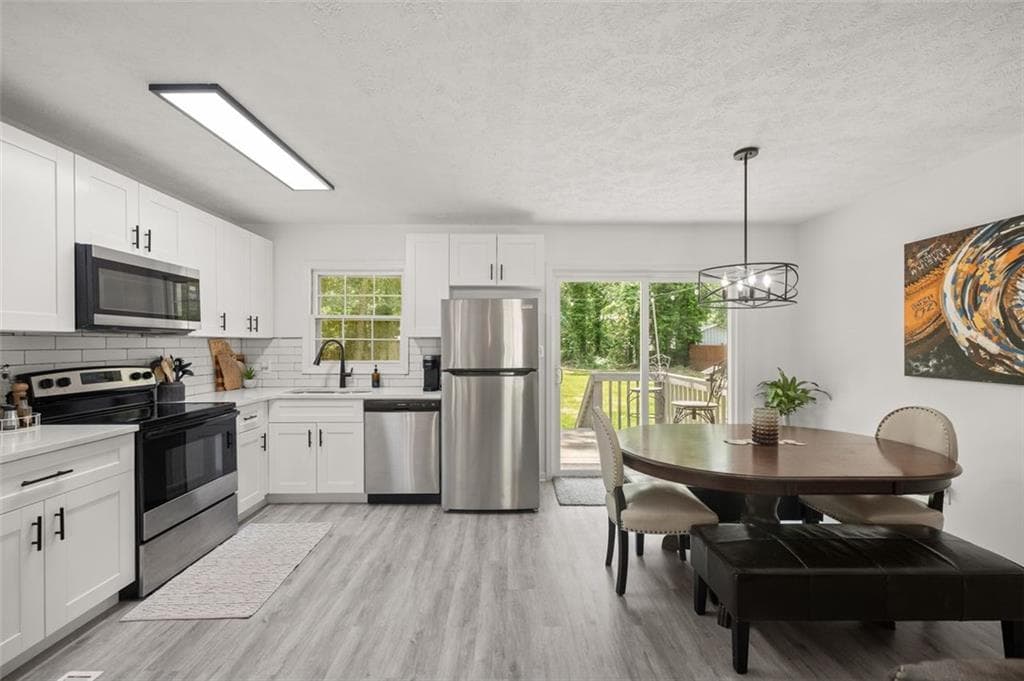 3 bedroom, 3 bathroom, 1,646 sq ft single family residence for sale at 6262 LAUREL WOOD Trail, Flowery Branch, GA 30542 — photo 8