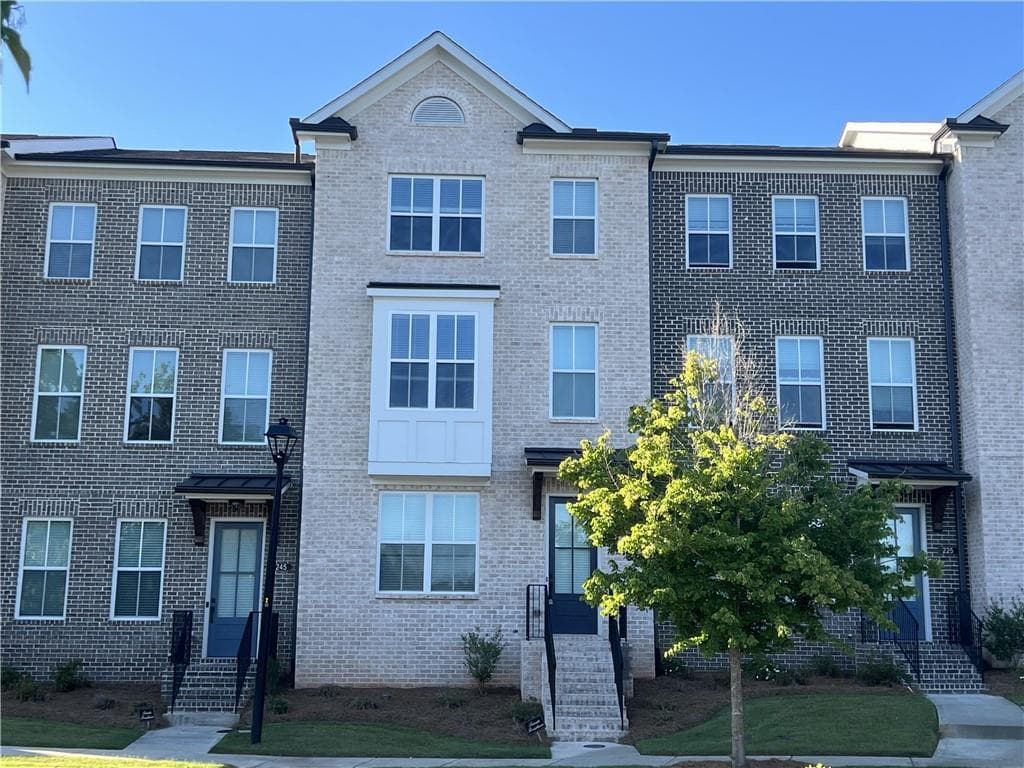 3 bedroom, 4 bathroom, 2,058 sq ft townhouse for rent at 235 Sims Park Place, Suwanee, GA 30024 for $2,900 a month — photo 1 of 31