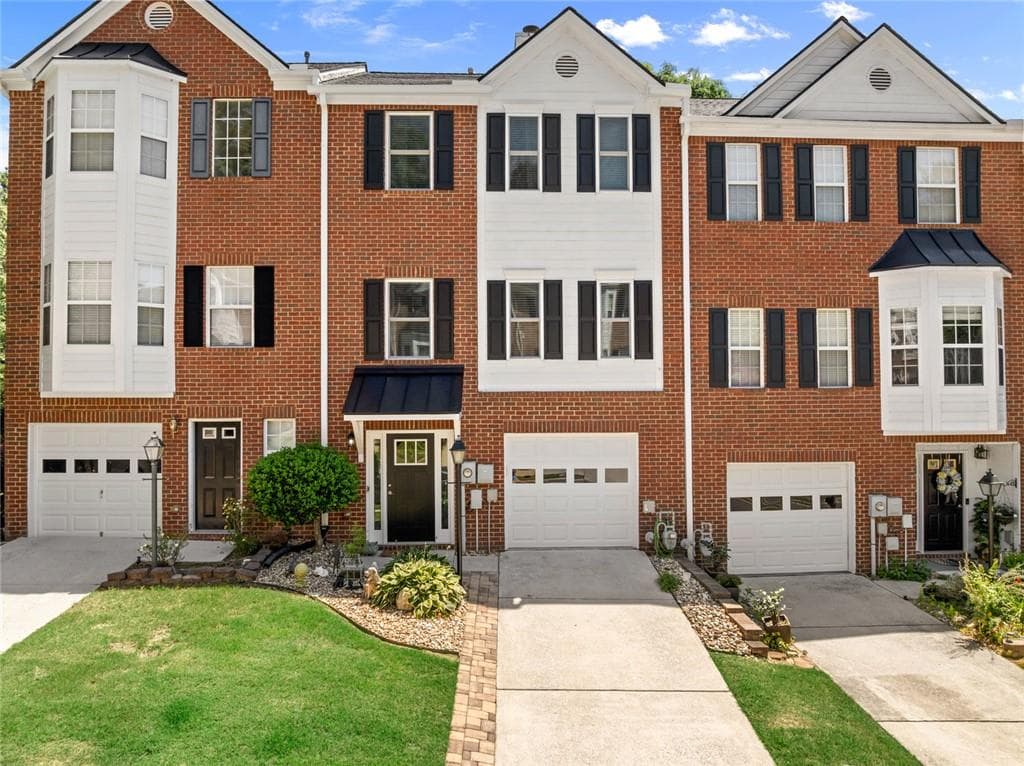 3 bedroom, 4 bathroom, 1,937 sq ft townhouse for sale at 2105 Millgate Lane, Buford, GA 30519
