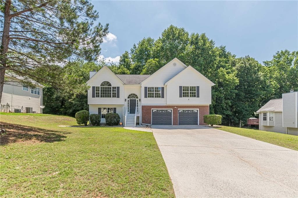 4 bedroom, 3 bathroom, 1,916 sq ft single family residence for sale at 133 Four Oaks Drive, Powder Springs, GA 30127 — photo 2