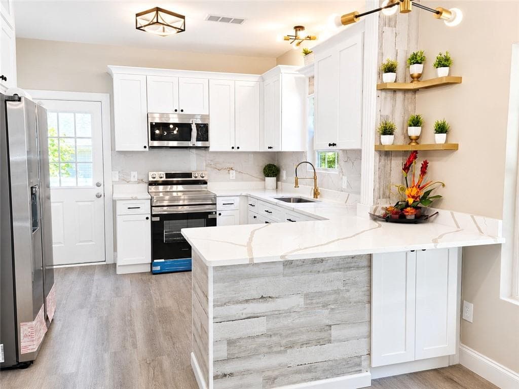 3 bedroom, 2 bathroom, 1,536 sq ft single family residence for sale at 9005 Lemans Trail, Gainesville, GA 30506 — photo 5
