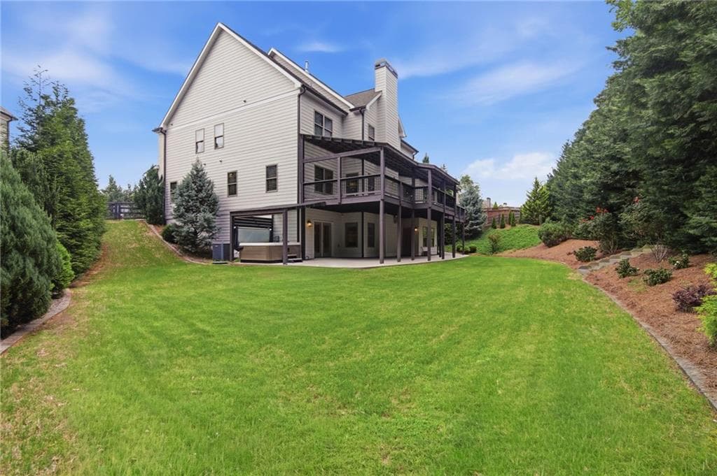 5 bedroom, 6 bathroom, 5,660 sq ft single family residence for sale at 4915 Hanson Farms Lane, Cumming, GA 30040 — photo 3