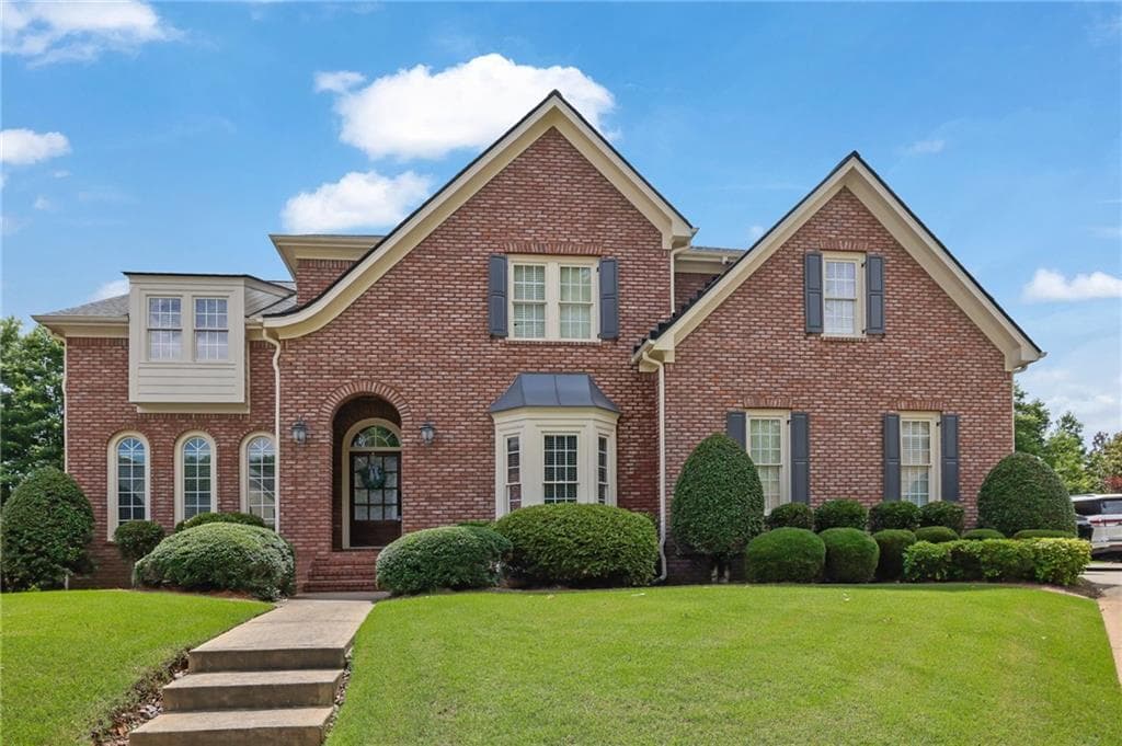6 bedroom, 6 bathroom, 6,128 sq ft single family residence under contract at 943 Tarry Post Court, Suwanee, GA 30024