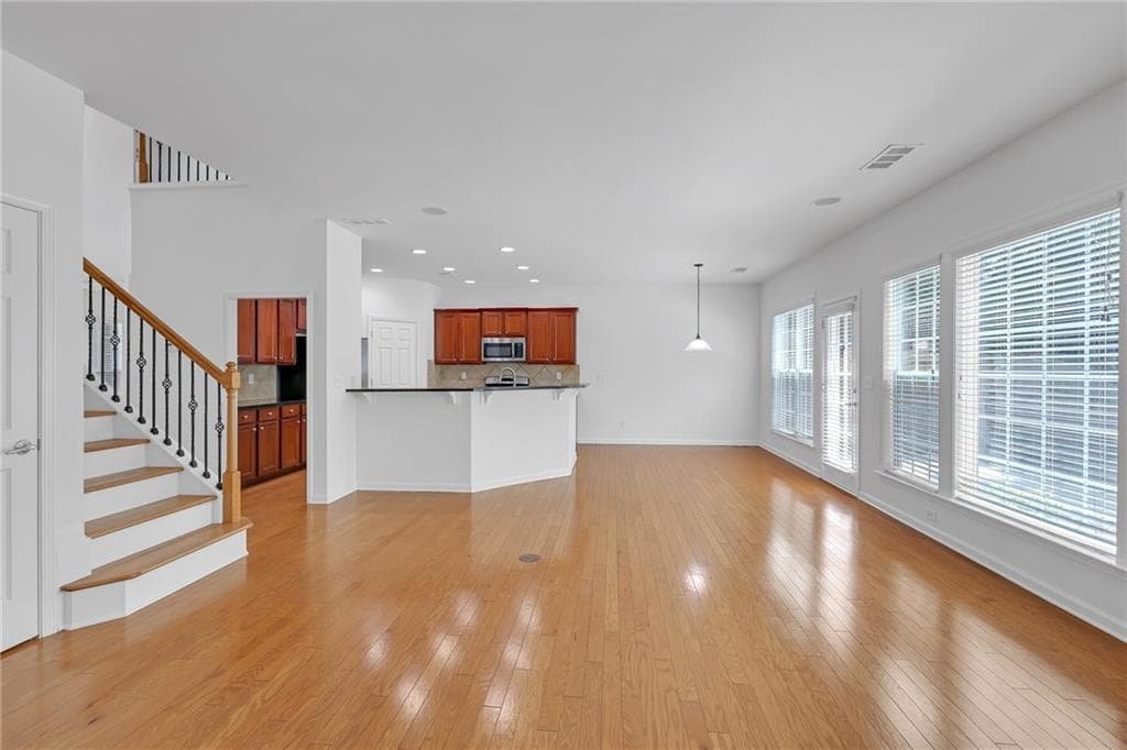 5 bedroom, 3 bathroom, 2,472 sq ft single family residence for sale at 5608 Avonley Creek Drive, Buford, GA 30518 — photo 9
