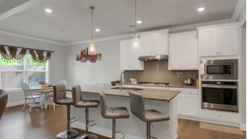 5 bedroom, 4 bathroom, 3,233 sq ft single family residence for sale at 1563 Dover Creek Lane, Lawrenceville, GA 30045 — photo 8