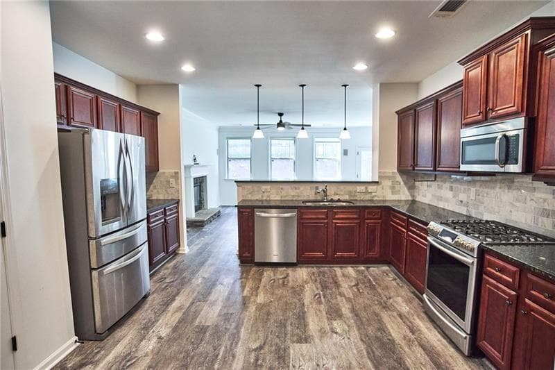 4 bedroom, 3 bathroom, 2,388 sq ft single family residence for sale at 310 Woodson Way, Woodstock, GA 30189 — photo 3