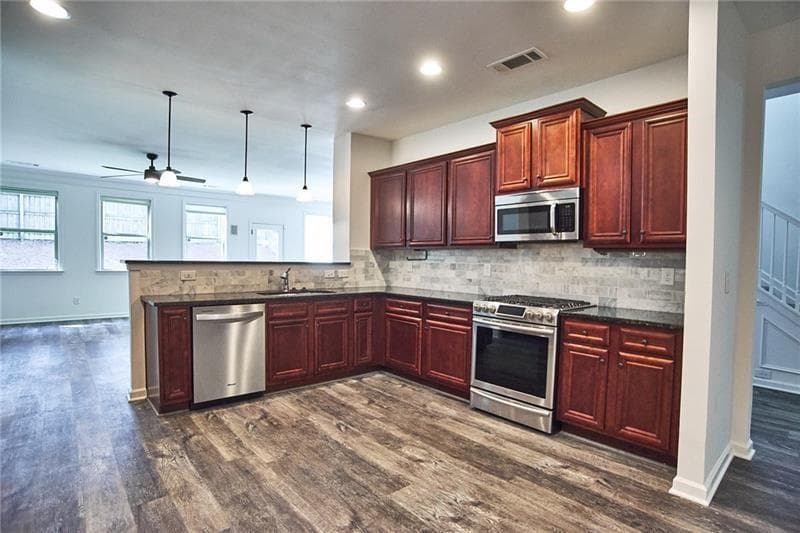 4 bedroom, 3 bathroom, 2,388 sq ft single family residence for sale at 310 Woodson Way, Woodstock, GA 30189 — photo 4