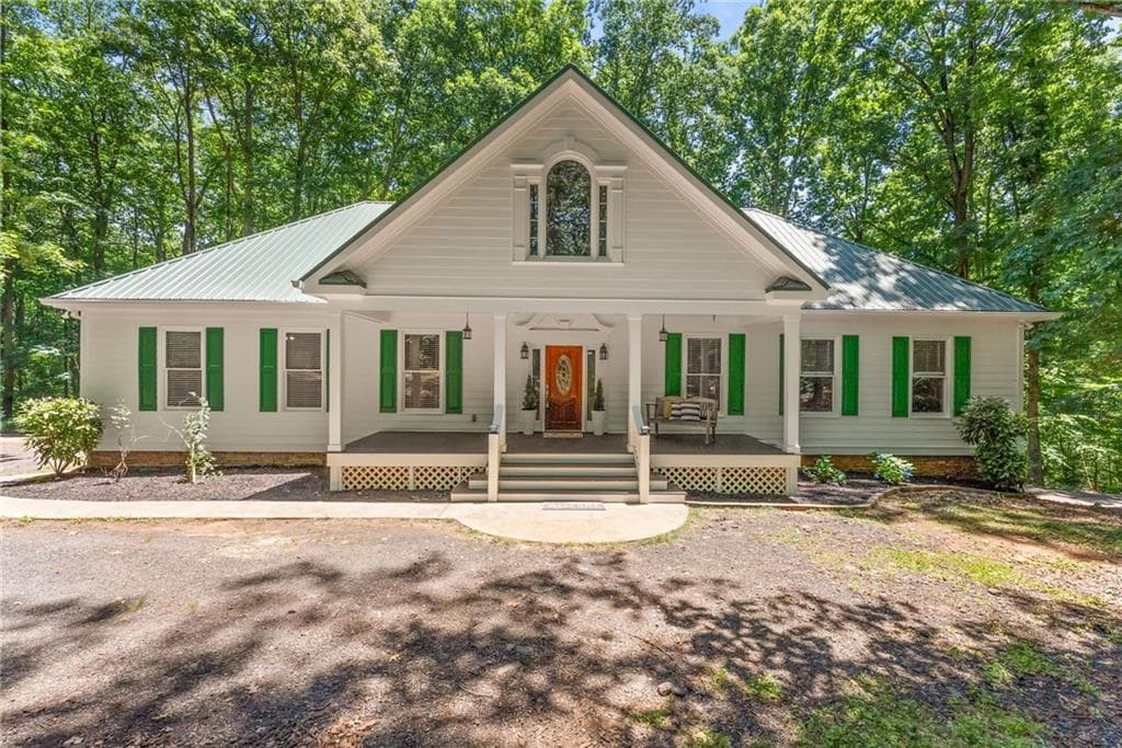 4 bedroom, 3 bathroom, 3,500 sq ft single family residence for sale at 3807 Al Mangum Road, Talmo, GA 30575 — photo 2