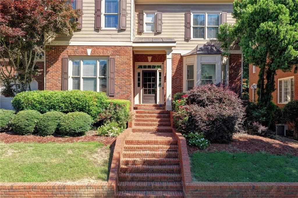 5 bedroom, 5 bathroom, 5,727 sq ft single family residence for sale at 991 Moores Walk Lane, Suwanee, GA 30024 — photo 2