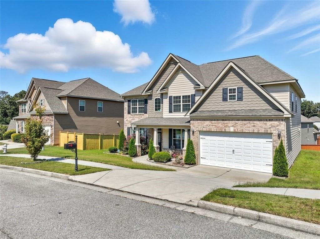 5 bedroom, 3 bathroom, 3,590 sq ft single family residence for sale at 1132 Cotton Oak Drive, Lawrenceville, GA 30045 — photo 2