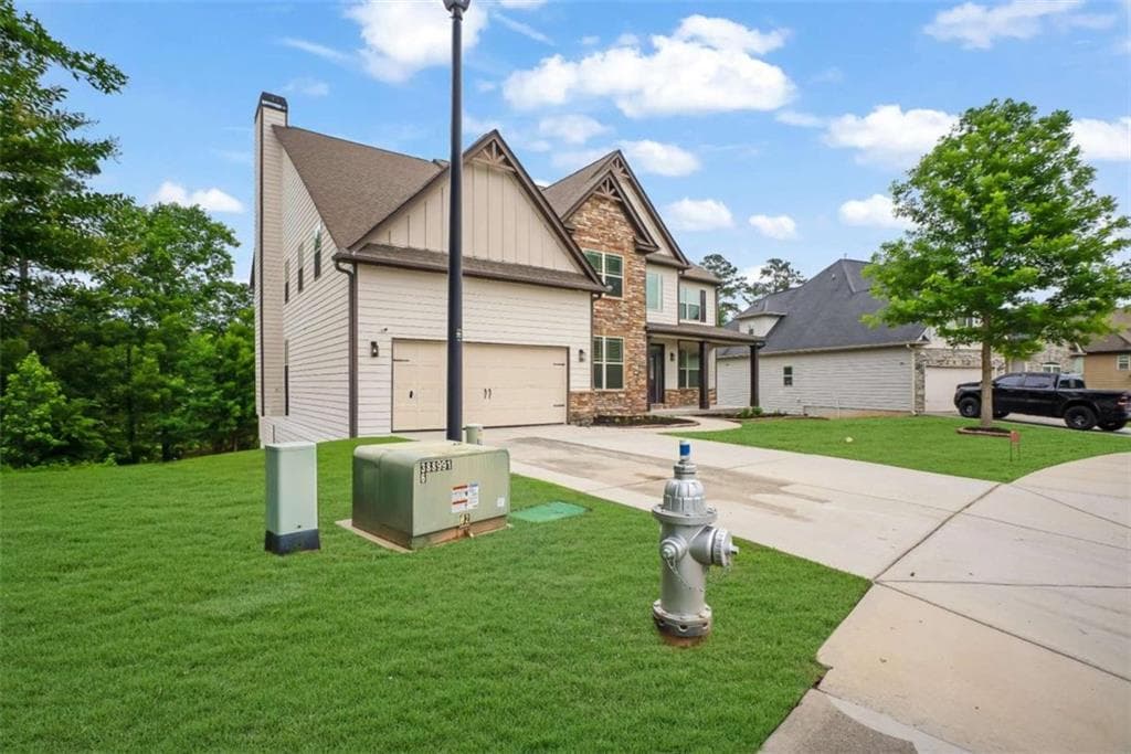 6 bedroom, 5 bathroom, 5,116 sq ft single family residence for sale at 190 Thrushwood Drive, Fayetteville, GA 30215 — photo 2