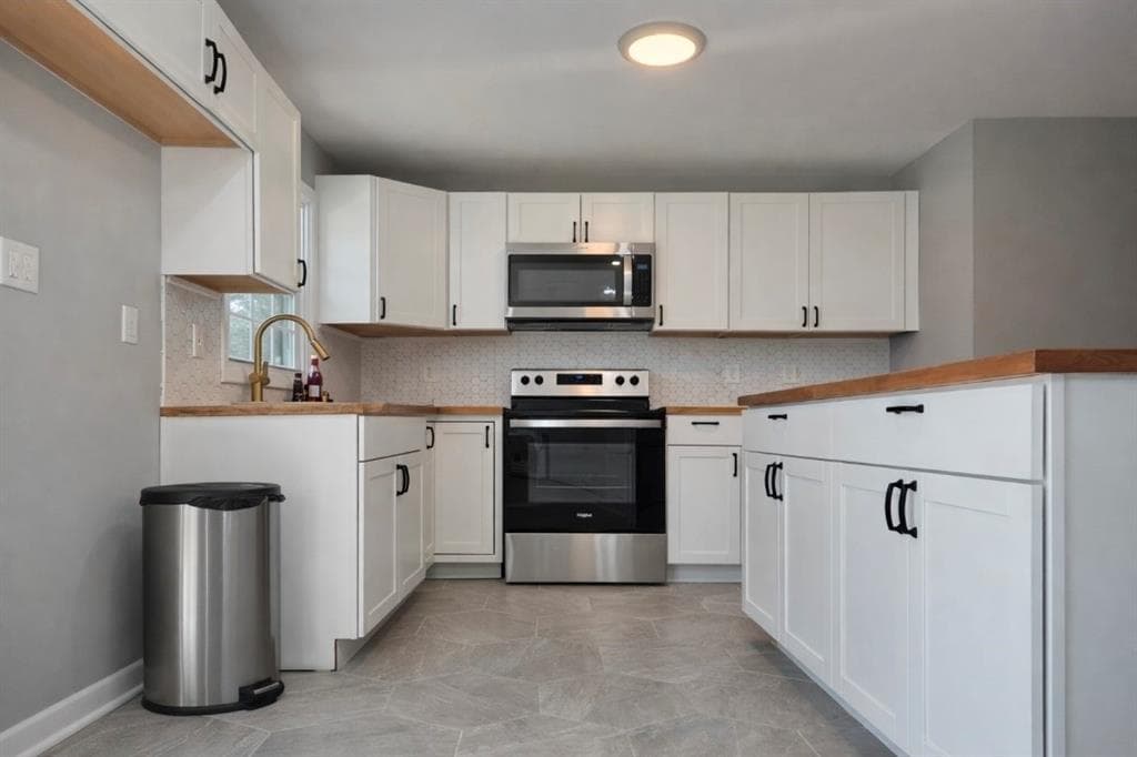 4 bedroom, 3 bathroom, 1,378 sq ft single family residence for sale at 1551 Pine Glen Circle, Decatur, GA 30035 — photo 9