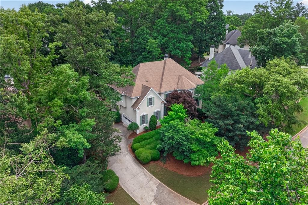 5 bedroom, 3 bathroom, 3,580 sq ft single family residence for sale at 1995 Woods River Lane, Duluth, GA 30097 — photo 2