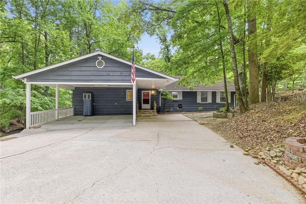 5 bedroom, 4 bathroom, 3,354 sq ft single family residence for sale at 7755 Kings Point Drive, Cumming, GA 30041 — photo 1 of 69