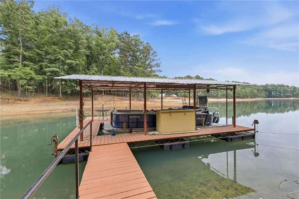 5 bedroom, 4 bathroom, 3,354 sq ft single family residence for sale at 7755 Kings Point Drive, Cumming, GA 30041 — photo 4