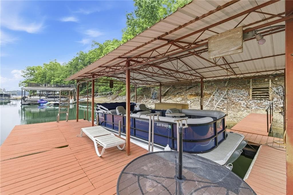 5 bedroom, 4 bathroom, 3,354 sq ft single family residence for sale at 7755 Kings Point Drive, Cumming, GA 30041 — photo 5