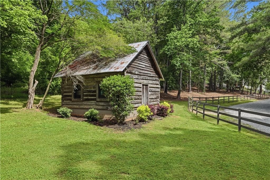 4 bedroom, 4 bathroom, 3,665 sq ft single family residence for sale at 7445 Fox Hat Lane, Cumming, GA 30028 — photo 2