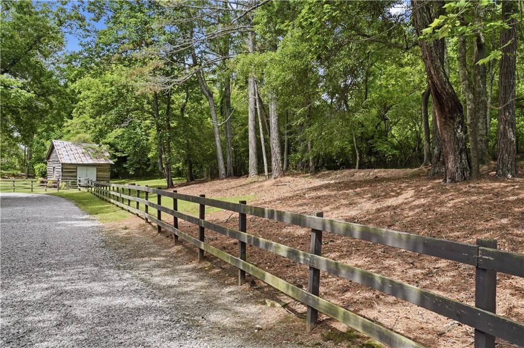 4 bedroom, 4 bathroom, 3,665 sq ft single family residence for sale at 7445 Fox Hat Lane, Cumming, GA 30028 — photo 4