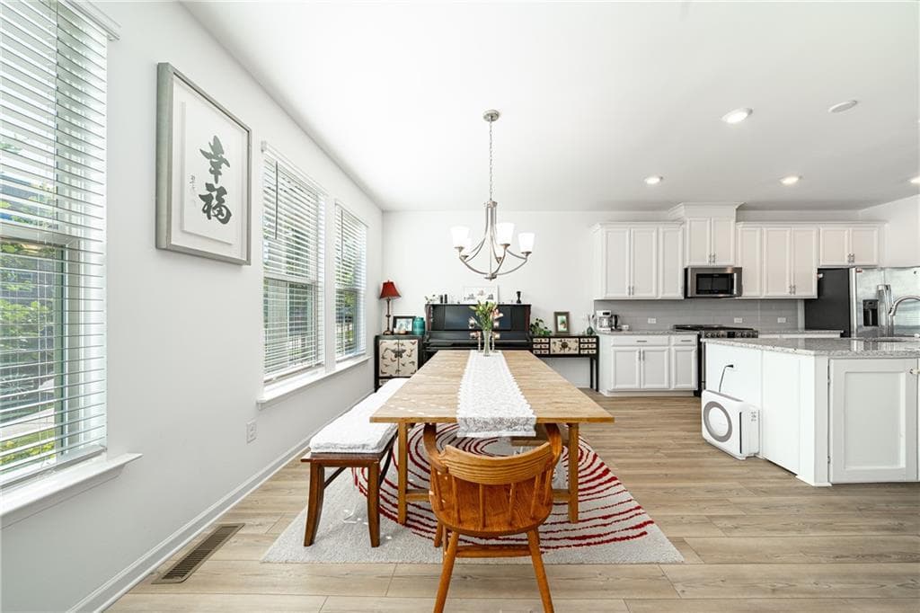 4 bedroom, 4 bathroom, 2,316 sq ft townhouse for sale at 2679 Richmond Row Drive, Suwanee, GA 30024 — photo 6