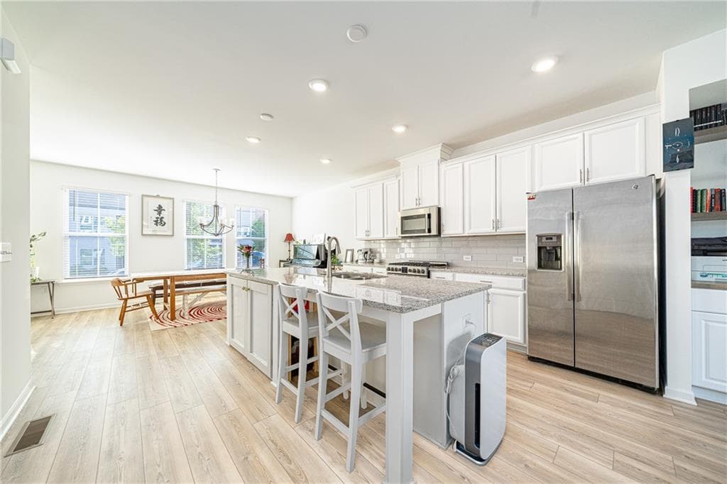 4 bedroom, 4 bathroom, 2,316 sq ft townhouse for sale at 2679 Richmond Row Drive, Suwanee, GA 30024 — photo 7