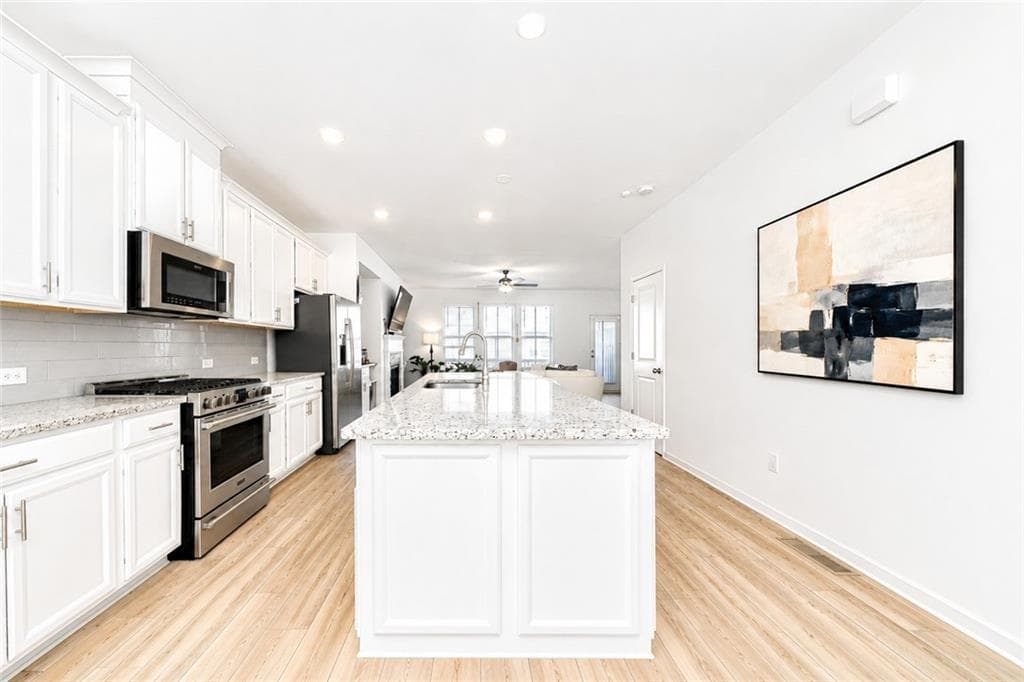 4 bedroom, 4 bathroom, 2,316 sq ft townhouse for sale at 2679 Richmond Row Drive, Suwanee, GA 30024 — photo 9