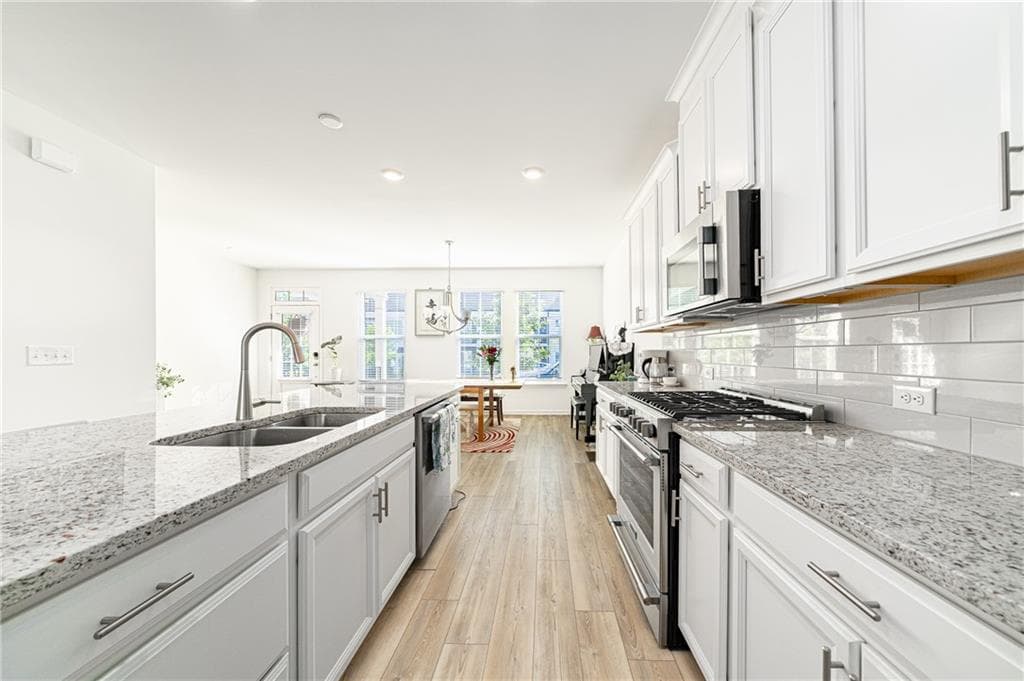 4 bedroom, 4 bathroom, 2,316 sq ft townhouse for sale at 2679 Richmond Row Drive, Suwanee, GA 30024 — photo 10