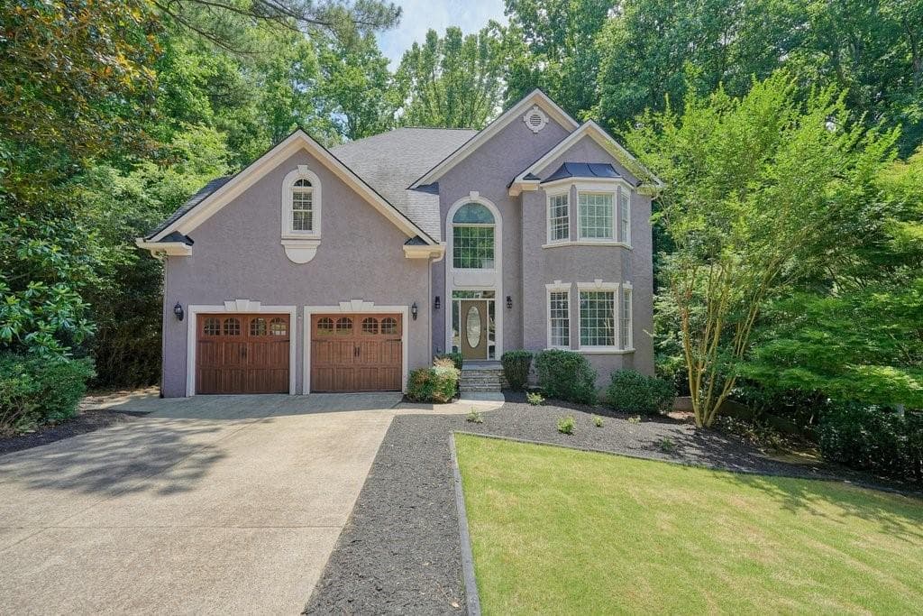 6 bedroom, 6 bathroom, 4,657 sq ft single family residence sold at 3233 Eagle Watch Drive, Woodstock, GA 30189